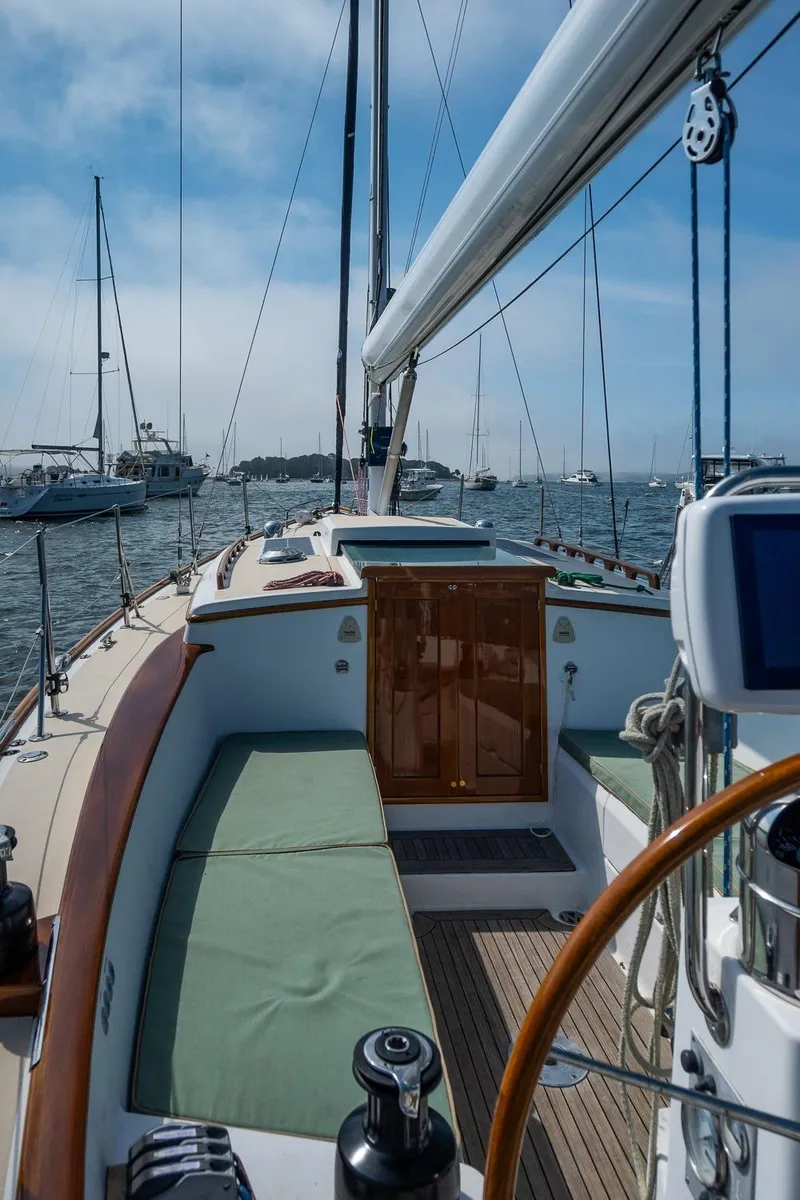 Slide: The Image of Sailing yacht Morris M36, 2005 model, on calm waters with clear skies. - 16