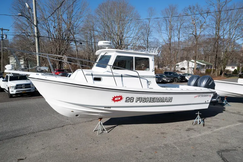 The Image of 2026 Steiger Craft 28 Fisherman boat on display, parked on stands in a lot. - 1