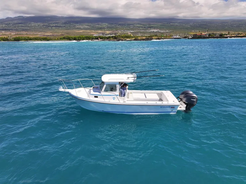The Image of 2026 Steiger Craft 28 Hawaii boat cruising on clear blue ocean waters. - 1