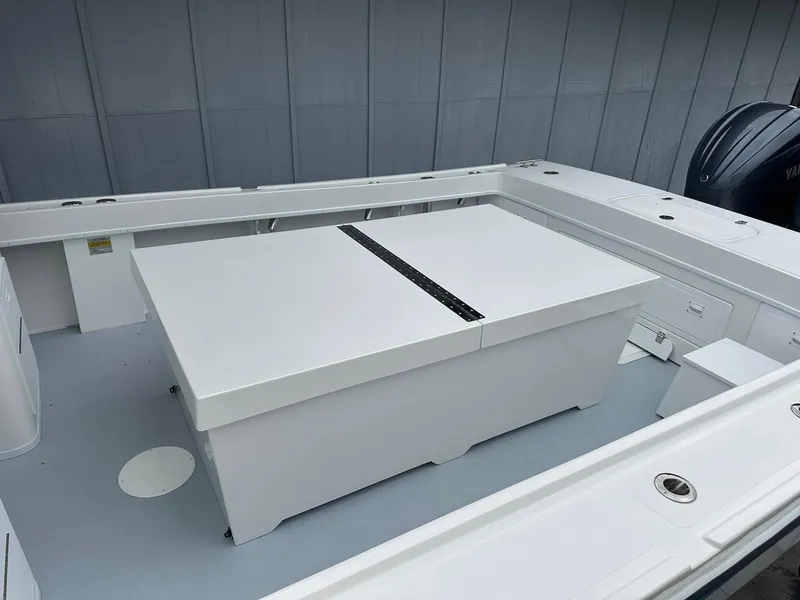 Slide: The Image of 2026 Steiger Craft 28 Hawaii boat deck with storage compartment and clean design. - 23