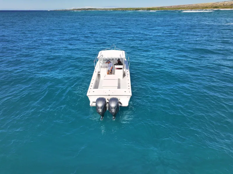 Slide: The Image of 2026 Steiger Craft 28 Hawaii boat cruising on clear blue ocean waters. - 4