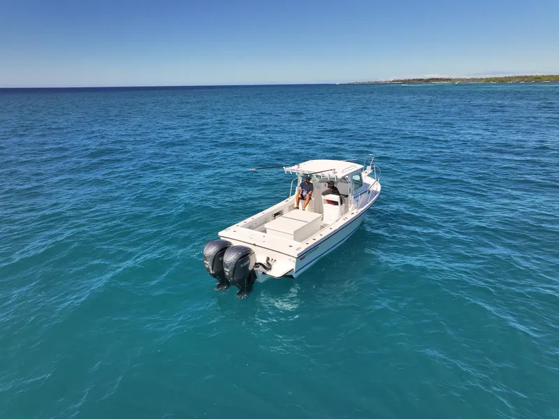 Slide: The Image of 2026 Steiger Craft 28 Hawaii boat on open blue ocean. - 5