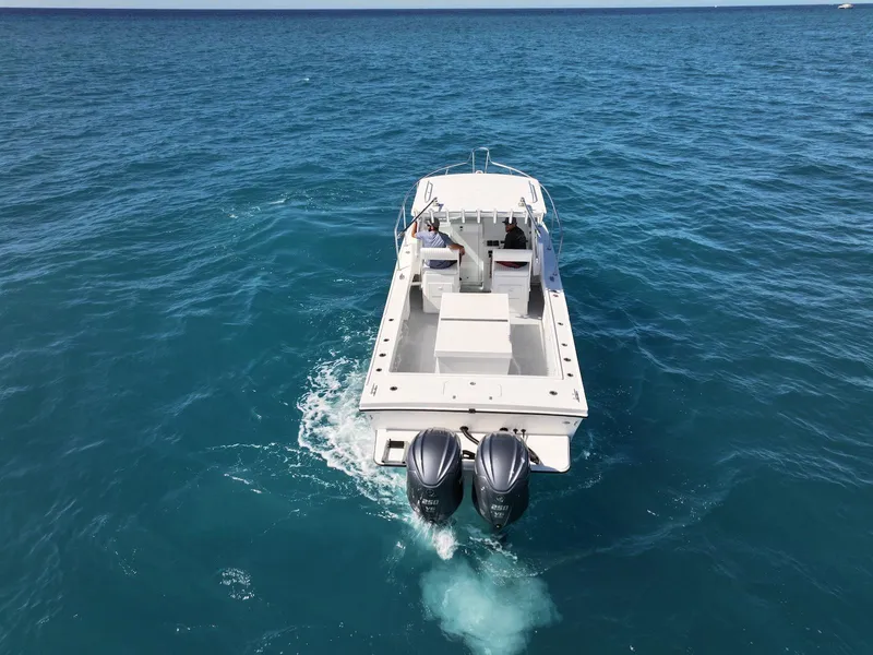 Slide: The Image of 2026 Steiger Craft 28 Hawaii boat cruising on open blue ocean waters. - 8