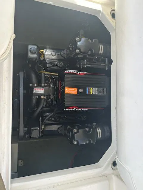 Slide: The Image of Engine compartment of a 1997 Sea Ray 240 Sundancer with MerCruiser engine. - 15