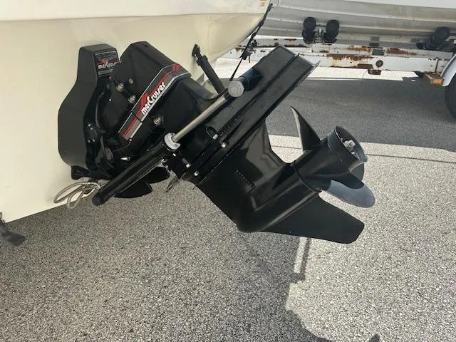 Slide: The Image of 1997 Sea Ray 240 Sundancer boat with MerCruiser outdrive on a trailer. - 3