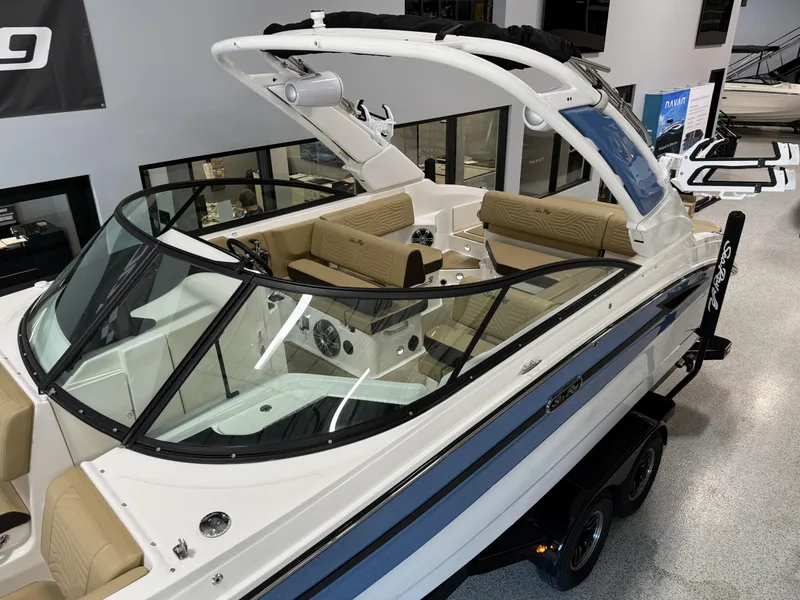 Slide: The Image of 2025 Sea Ray SDX250 Surf boat with sleek design and spacious seating. - 13
