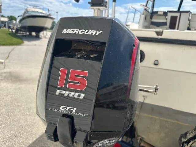 Slide: The Image of 1995 Bayliner Trophy with Mercury 15 Pro EFI FourStroke outboard motor. - 5