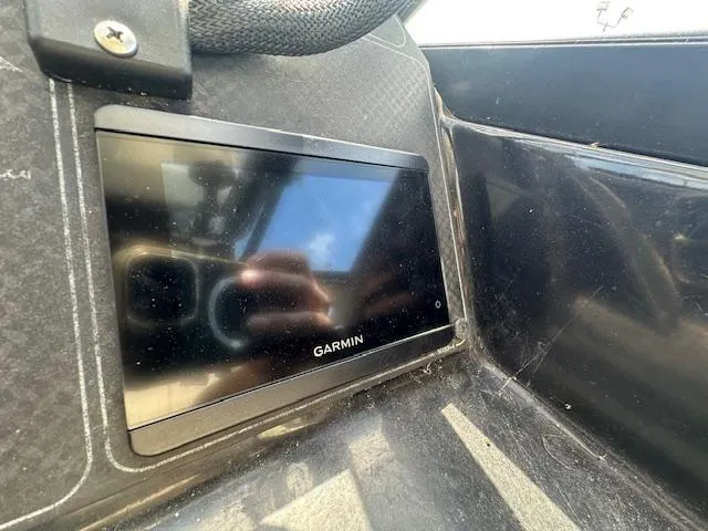 Slide: The Image of Garmin device installed on 1995 Bayliner Trophy boat dashboard. - 8