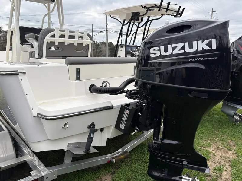 Slide: The Image of 2023 Sea Born LX22 boat with Suzuki four-stroke outboard motor on trailer. - 3