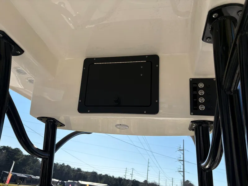 Slide: The Image of 2024 Sea Born FX FX24 boat console with black frame and control panel. - 10