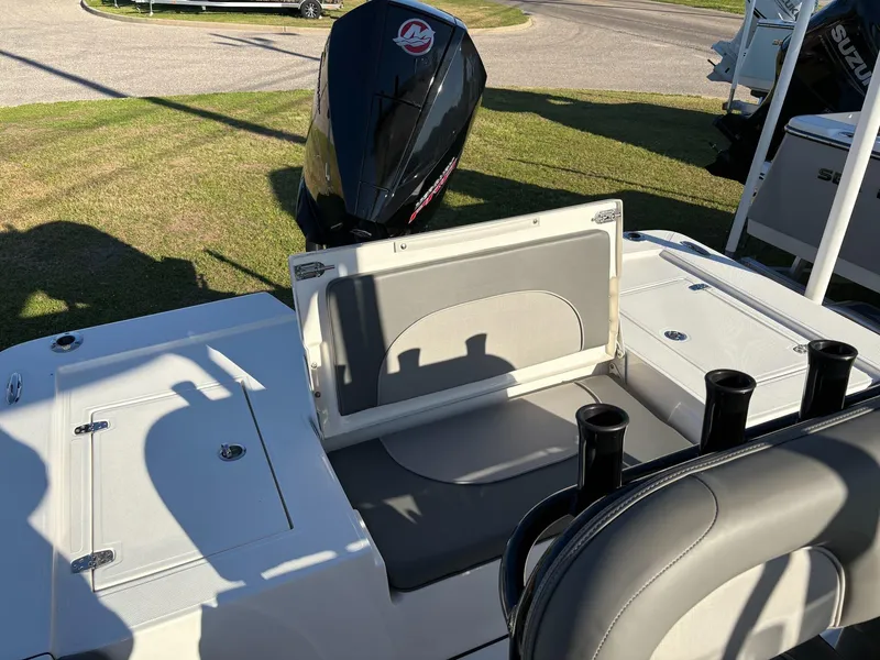 Slide: The Image of 2024 Sea Born FX FX24 boat interior with seating and storage compartments. - 7