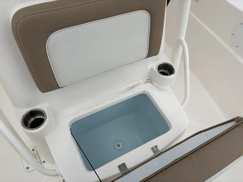 Slide: The Image of 2025 Sea Born LX LX24 boat seat with built-in storage and cup holders. - 21