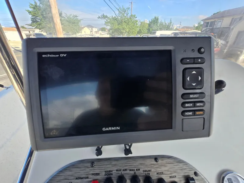 Slide: The Image of Garmin echomap DV on 2016 Carolina Skiff 238 DLV boat dashboard. - 15