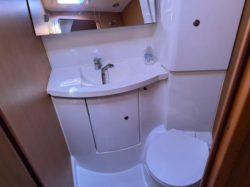 Slide: The Image of Compact bathroom in 2008 Jeanneau Sun Odyssey 42 I yacht with sink and toilet. - 17