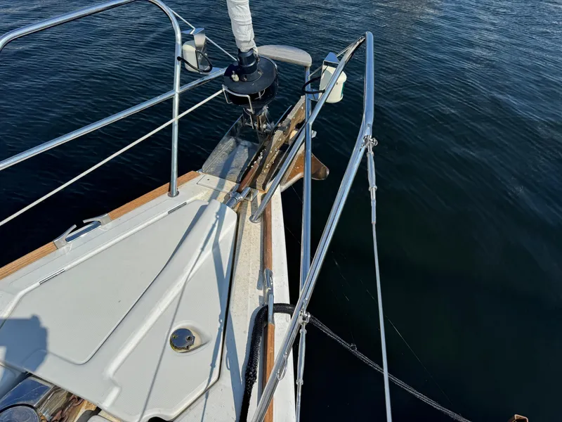 Slide: The Image of Bow of 2008 Jeanneau Sun Odyssey 42 I sailboat on calm water. - 9