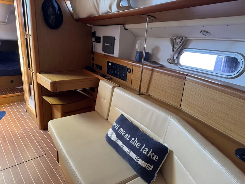 Slide: The Image of Interior of 2008 Jeanneau Sun Odyssey 42 I yacht with cozy seating and nautical decor. - 18