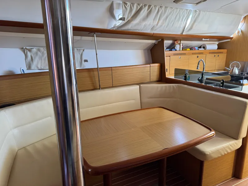 Slide: The Image of Interior of 2008 Jeanneau Sun Odyssey 42 I yacht with dining area and kitchen. - 19