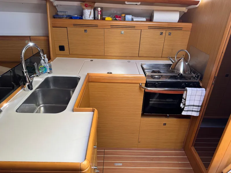 Slide: The Image of Galley kitchen in 2008 Jeanneau Sun Odyssey 42 I yacht with sink and stove. - 20
