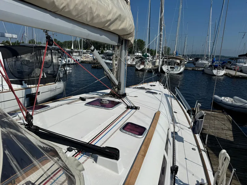 Slide: The Image of 2008 Jeanneau Sun Odyssey 42 I sailboat docked at a marina, surrounded by other boats. - 8