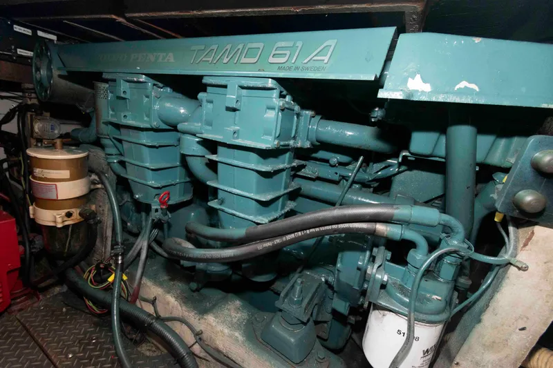 Slide: The Image of Engine room of 1989 Tiara Yachts 36 Convertible with Volvo Penta TAMD 61A engine. - 16