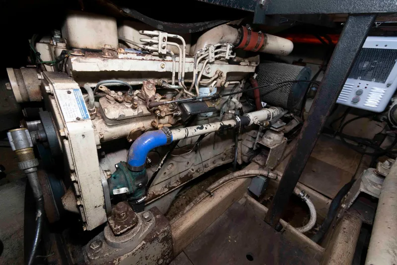 Slide: The Image of Engine room of a 1986 Shannon Brendan 32 boat, showcasing mechanical components. - 19