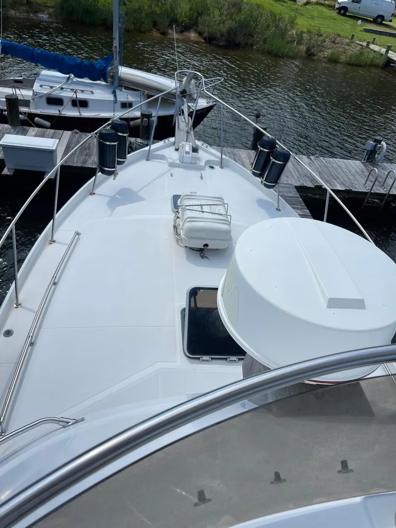 Slide: The Image of 1986 Shannon Brendan 32 yacht docked at marina, view from deck. - 5