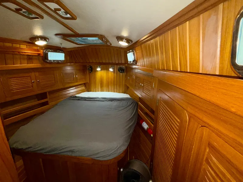 Slide: The Image of Luxurious wooden cabin interior of 2005 Cabo Rico 42 Pilot yacht. - 7
