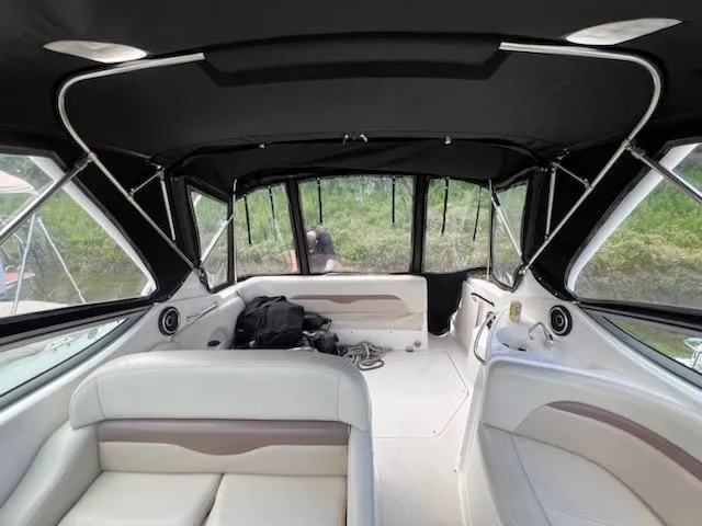 Slide: The Image of 2005 Chaparral 270 Signature boat interior with seating and canopy. - 8