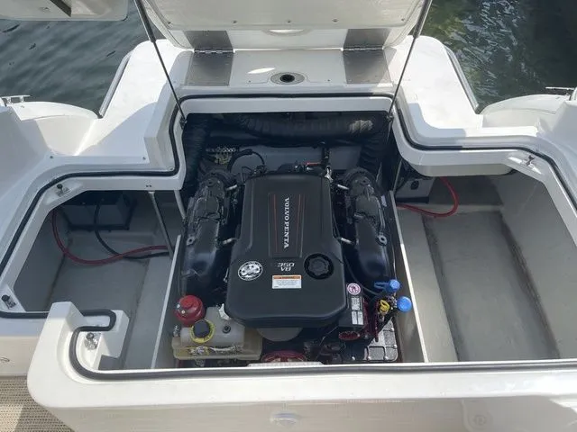 Slide: The Image of 2019 Cobalt R5 boat engine compartment with Volvo Penta engine, open hatch view. - 32
