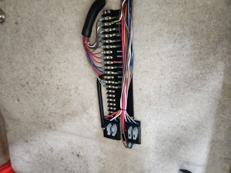 Slide: The Image of Electrical panel with wiring in a 2000 World Cat 266 Leisure Cat boat. - 24