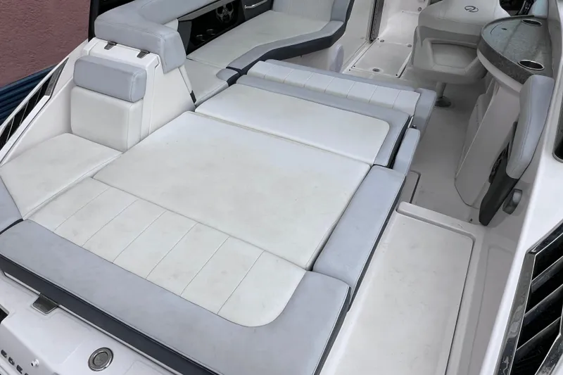 Slide: The Image of 2013 Regal 24 FasDeck RX boat interior with spacious seating and modern design. - 26