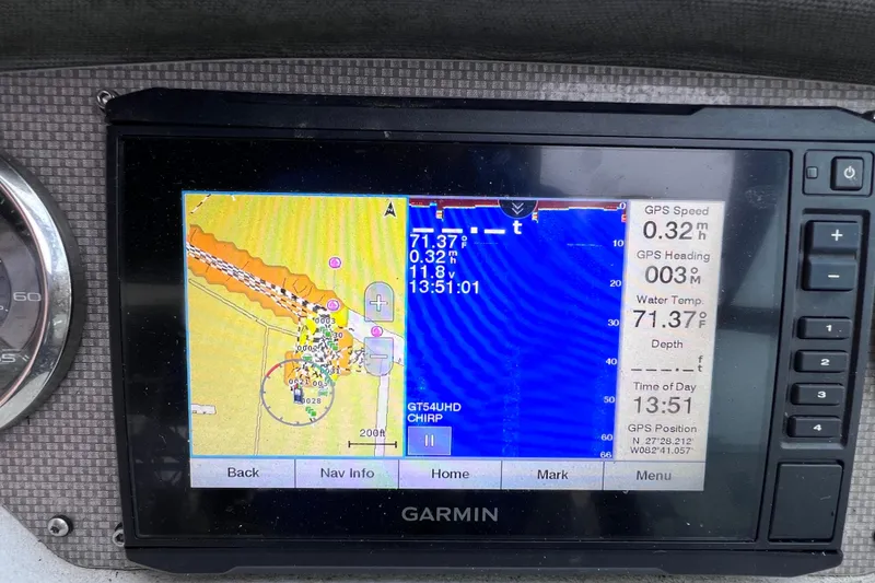 Slide: The Image of Garmin GPS display on a 2013 Regal 24 FasDeck RX boat showing navigation data. - 41