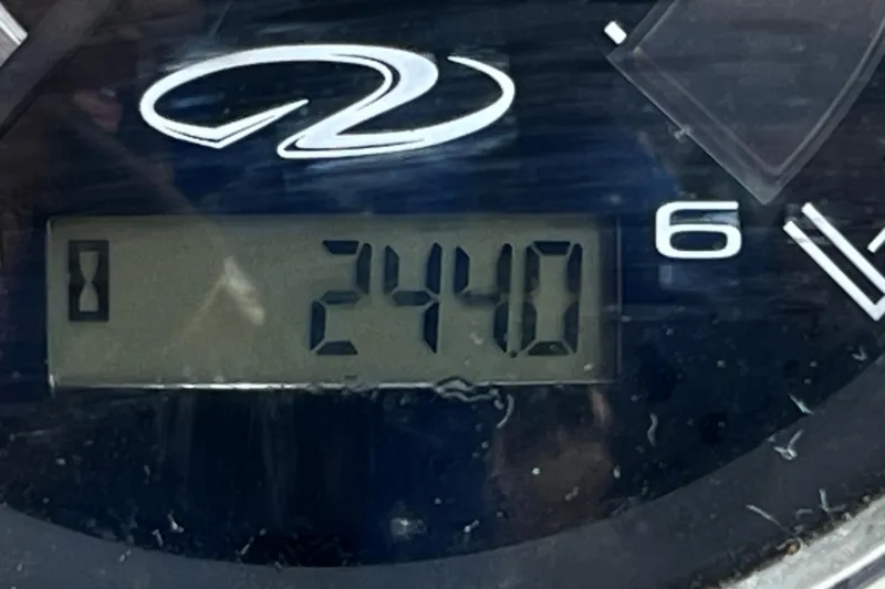Slide: The Image of Digital display showing 2440 hours on a 2013 Regal 24 FasDeck RX boat. - 42