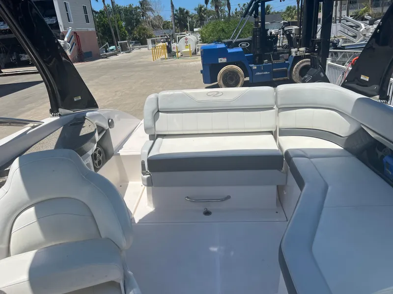 Slide: The Image of Interior of a 2013 Regal 24 FasDeck RX boat with white seating. - 8