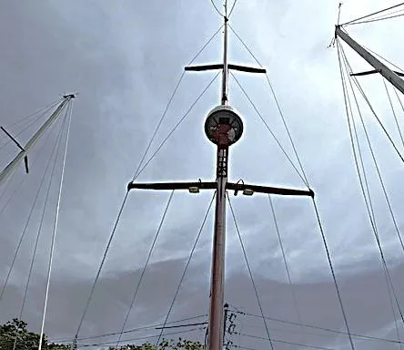 Slide: The Image of Mast of 1993 Tartan 3500 sailboat against cloudy sky. - 18