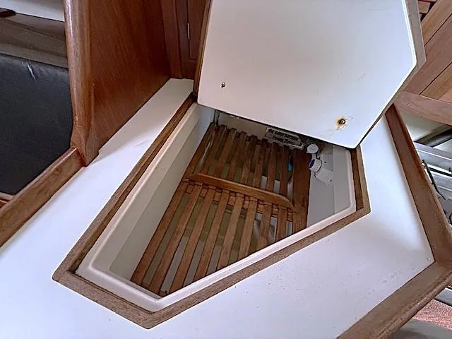 Slide: The Image of Open storage compartment in a 1993 Tartan 3500 sailboat interior. - 25
