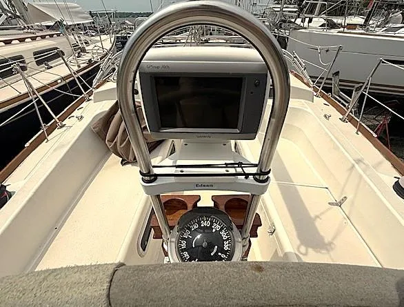 Slide: The Image of Cockpit of 1993 Tartan 3500 sailboat with navigation equipment and compass. - 6
