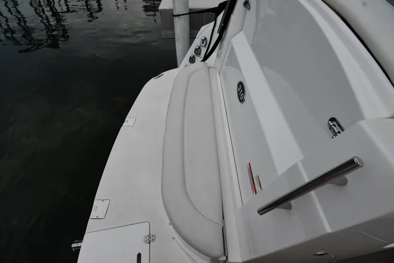 Slide: The Image of 2014 Rinker 310 Express Cruiser swim platform and seating area. - 31