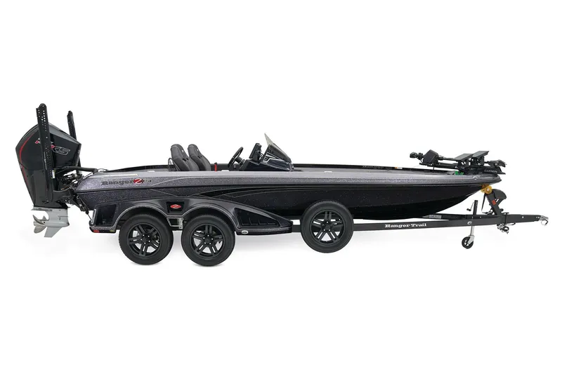 Slide: The Image of 2025 Ranger Z521 boat on trailer under clear blue sky. - 6