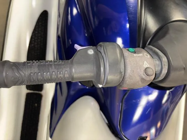 Slide: The Image of Close-up of 2001 Yamaha WaveRunner GP1200R handlebar with start button. - 18