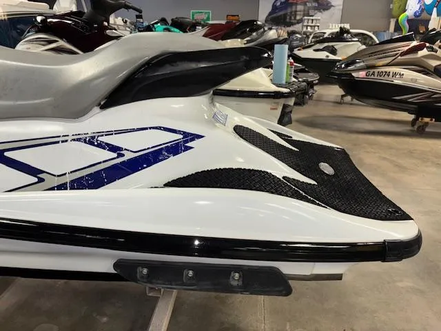 Slide: The Image of 2001 Yamaha WaveRunner GP1200R jet ski in showroom, side view. - 4