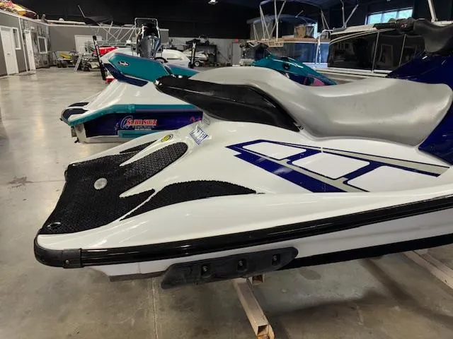 Slide: The Image of 2001 Yamaha WaveRunner GP1200R jet ski in showroom, side view. - 7
