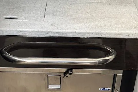 Slide: The Image of Stainless steel handle on a 2017 Formula 350 CBR boat interior. - 13