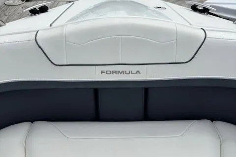 Slide: The Image of 2017 Formula 350 CBR boat interior with white and black seating. - 14