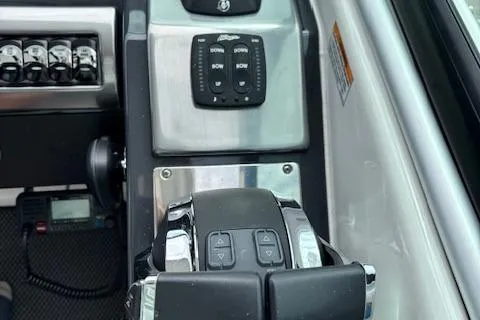 Slide: The Image of Control panel of a 2017 Formula 350 CBR boat with throttle and switches. - 15