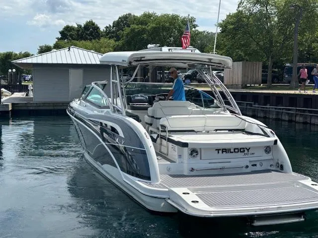 Slide: The Image of 2017 Formula 350 CBR boat docked, featuring sleek design and spacious deck. - 4