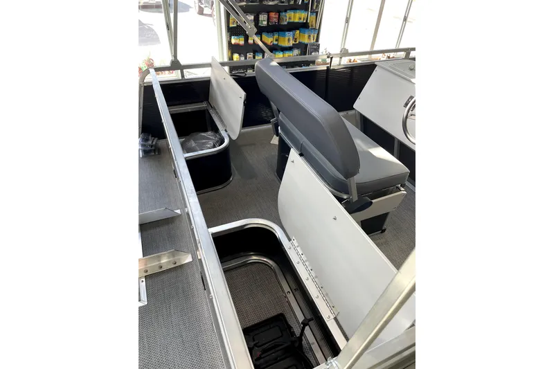 Slide: The Image of 2026 Paddle King LO PRO FISHER interior with seating and storage compartments. - 8