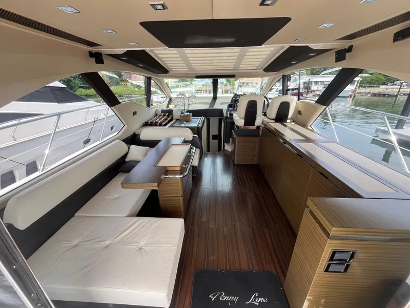 Slide: The Image of Luxurious interior of a 2014 Azimut 55S yacht with elegant seating and modern design. - 12