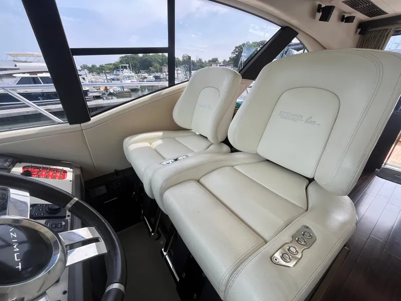 Slide: The Image of Luxurious interior of a 2014 Azimut 55S yacht with plush white seating. - 20