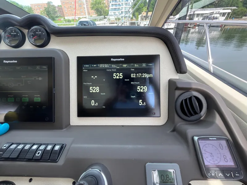 Slide: The Image of Control panel of a 2014 Azimut 55S yacht with Raymarine displays. - 22